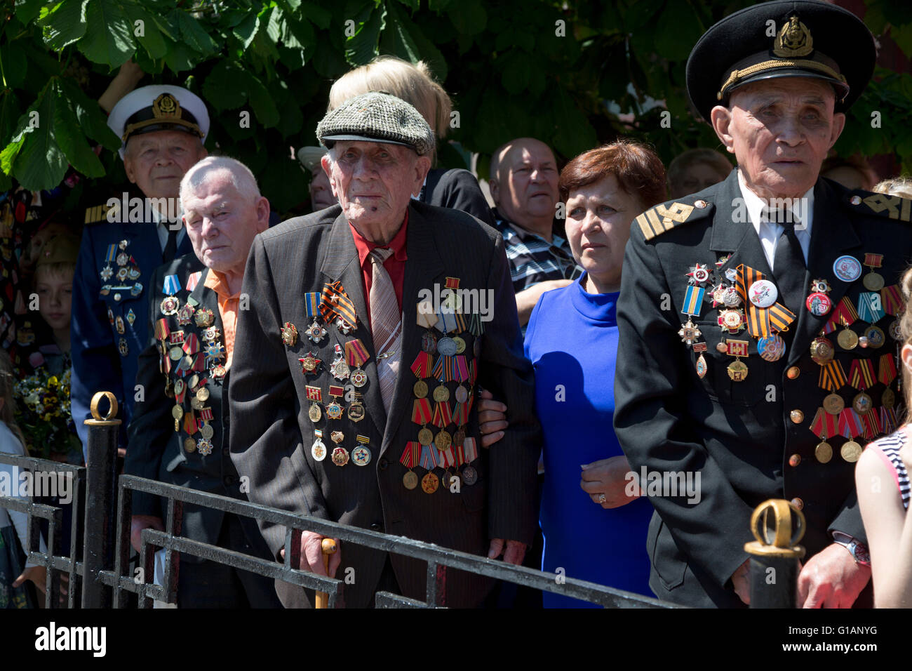 Veterans of the World War II watches a military parade on Victory Day ...