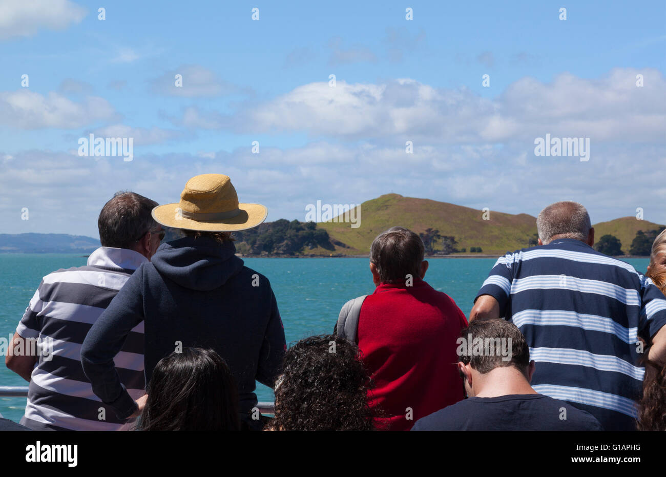 Island off of Auckland New Zealand with tourist on a ferry boat Stock