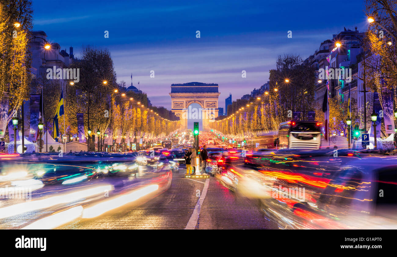 Avenue des Champs-Elysees with Christmas lighting leading up to the Arc de Triomphe in Paris, France Stock Photo
