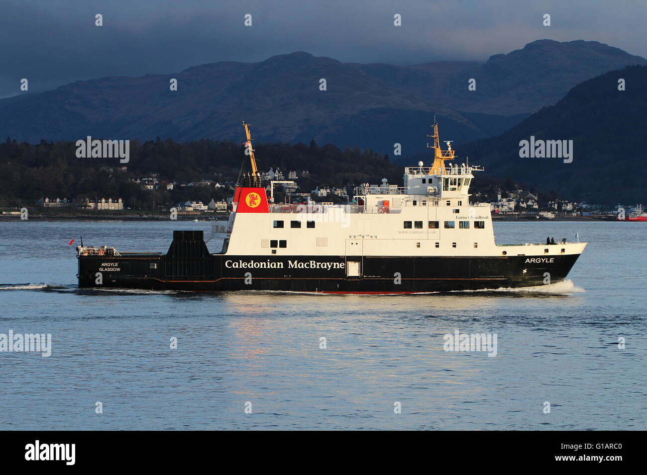 MV Argyle, a car ferry operated by Caledonian MacBrayne (CalMac), passing Cloch Point on the Firth of Clyde. Stock Photo