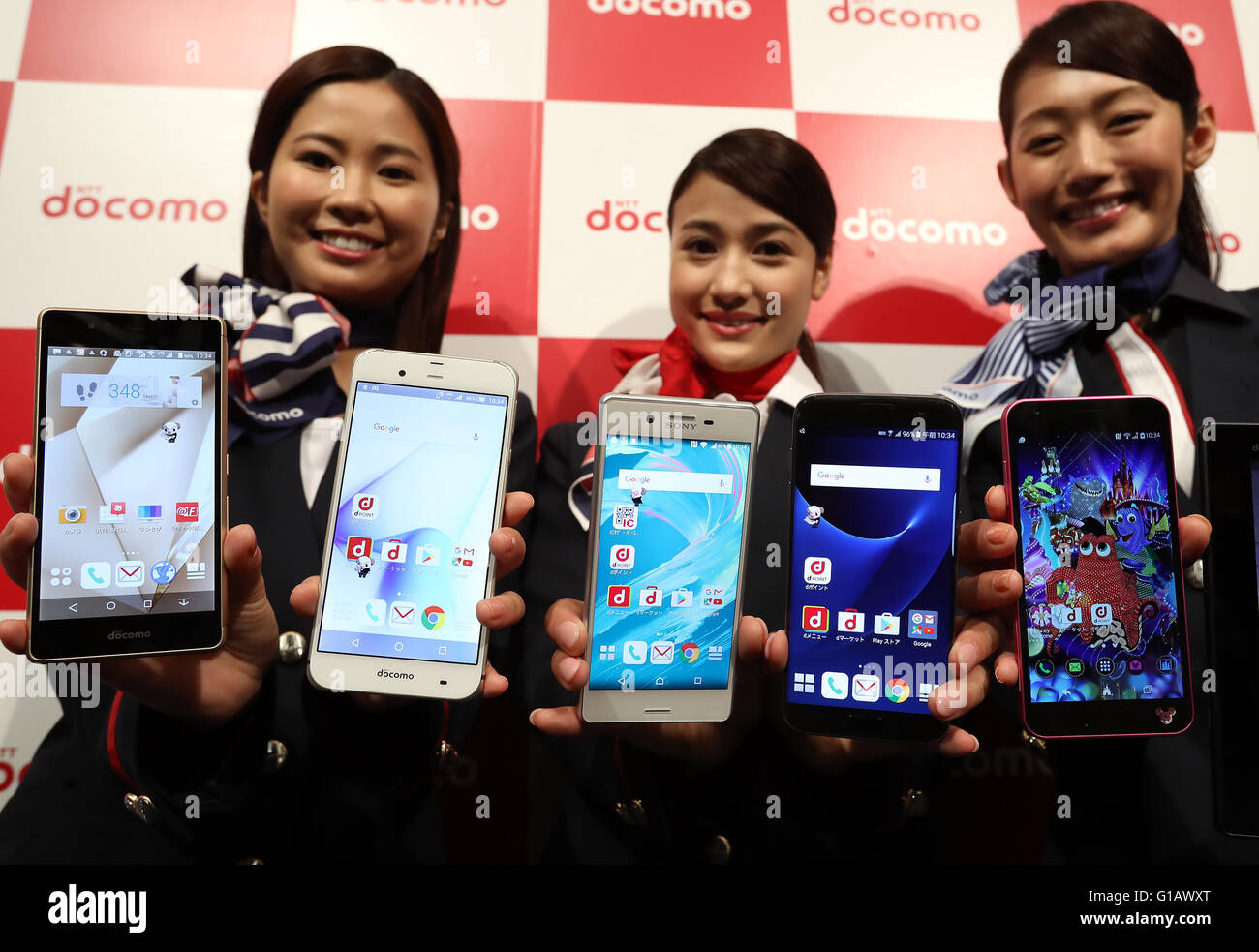 Tokyo, Japan. 11th May, 2016. Models display Japanese mobile