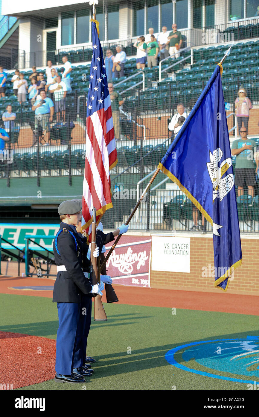 MAY 10, 2016: The Color Guard presents the United States flag and the Louisiana State flag before the First NBC Cup game between Tulane and the University of New Orleans at Greer Field at Turchin Stadium in New Orleans LA Stock Photo