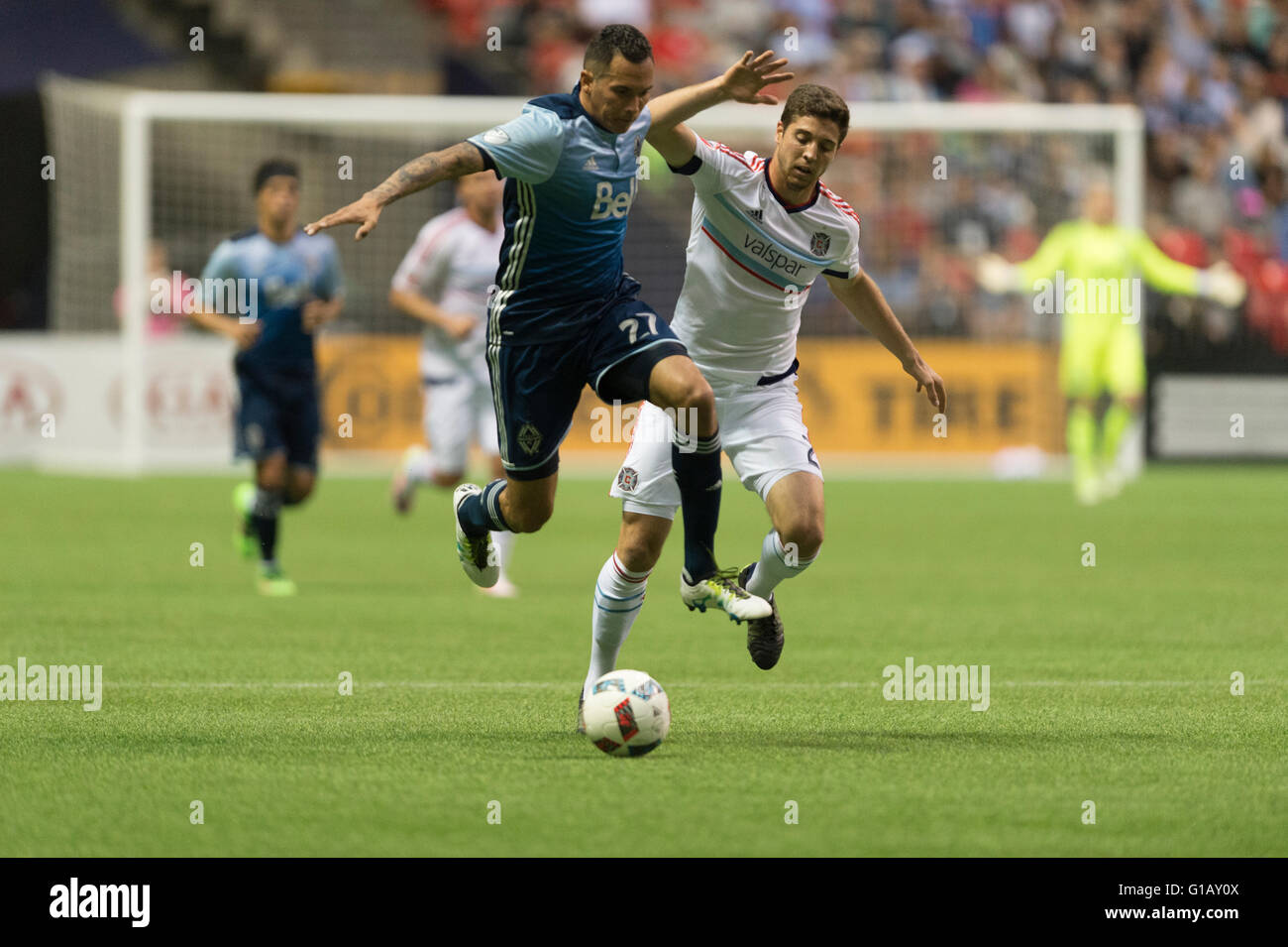 Vancouver, Canada. 11th May, 2016. Vancouver Whitecaps forward Blas Perez (27) fighting to keep the ball. Vancouver Whitecaps vs Chicago Fire, BC Place Stadium. Vancouver wins 2-1.  Credit:  Gerry Rousseau/Alamy Live News Stock Photo