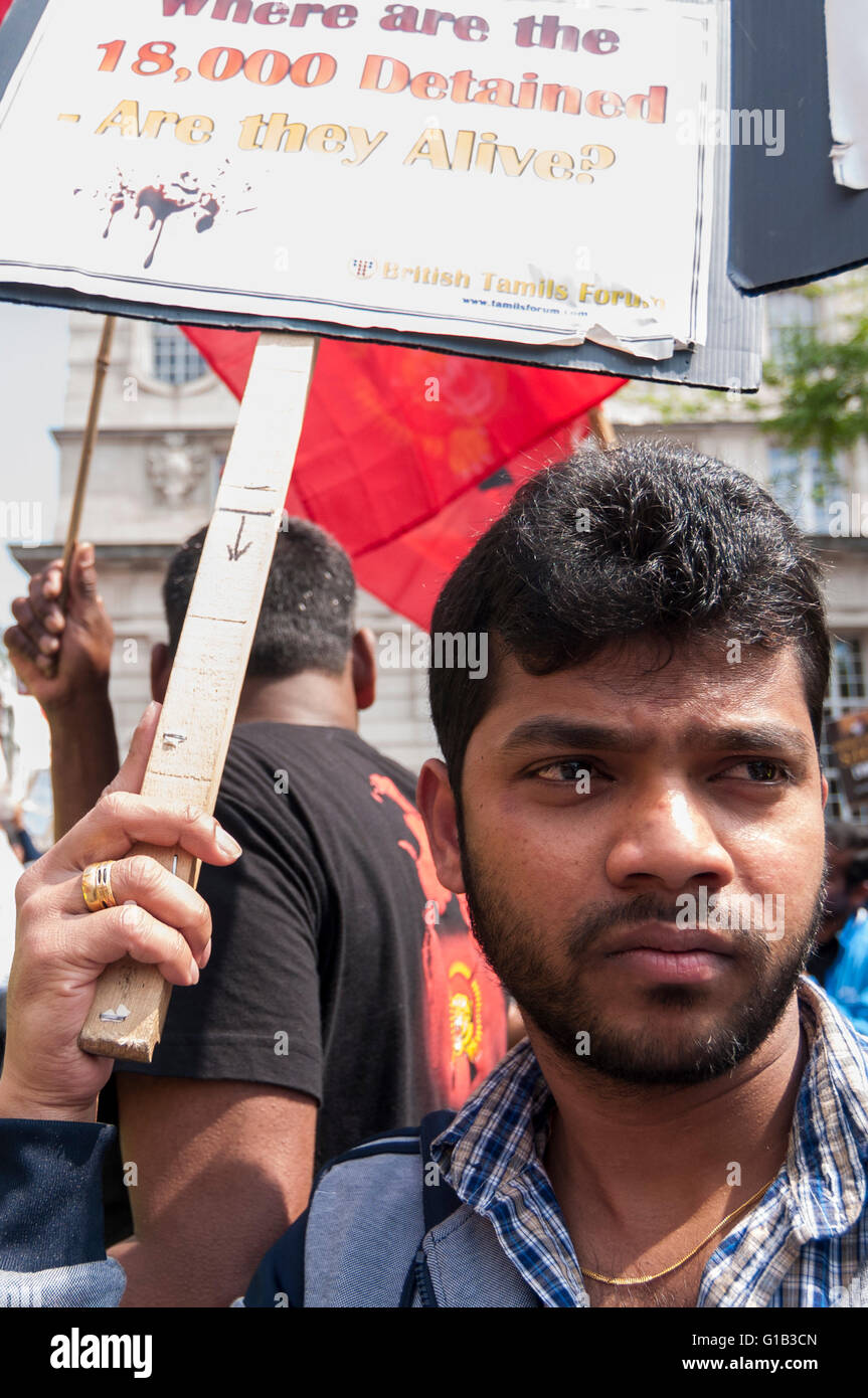 London, UK. 12 May 2016. Tamil demonstrators gather in Pall Mall to make their views known as Prime Minister, David Cameron, and other G20 leaders meet in nearby Lancaster House for the Anti-Corruption Summit 2016. Credit: Stephen Chung / Alamy Live News Stock Photo