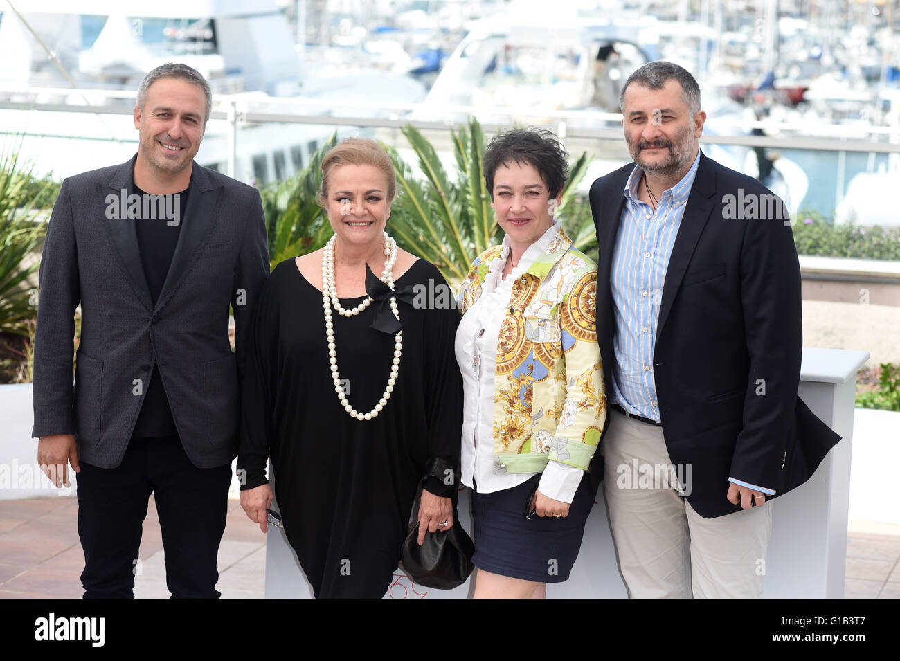 Cannes, France. 12th May, 2016. Actor Mimi Branescu, (l-r) actress Dana Dogaru, producer Anca Puiu and director Cristi Puiu attends at the photocall 'Sieranevada (Roumanie)' at the 69th Annual Cannes Film Festival at Palais des Festivals in Cannes, France, on 12 May 2016. Credit:  dpa picture alliance/Alamy Live News Stock Photo