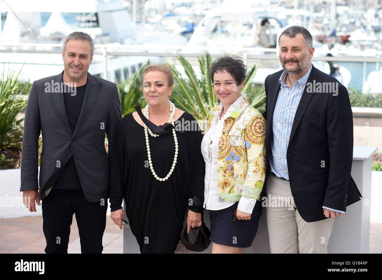 Actor Mimi Branescu, (l-r) actress Dana Dogaru, producer Anca Puiu and director Cristi Puiu attends at the photocall 'Sieranevada (Roumanie)' at the 69th Annual Cannes Film Festival at Palais des Festivals in Cannes, France, on 12. May 2016. Photo: Felix Hoerhager/dpa - NO WIRE SERVICE - Stock Photo