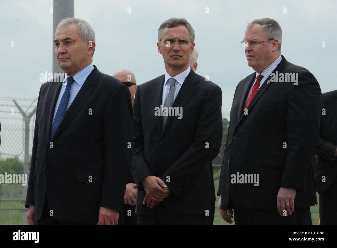 Deveselu, Bucharest. 12th May, 2016. NATO Secretary General Jens Stoltenberg(C), U.S. Deputy Secretary of Defense Robert Work(R) and Romanian Foreign Minister Lazar Comanescu attend the ceremony at Deveselu military base, southwest of Bucharest, Romania on May 12, 2016. The U.S. AEGIS Ashore missile defense system in Romania is certified for operations, NATO Secretary General Jens Stoltenberg announced Thursday. Credit:  Lin Huifen/Xinhua/Alamy Live News Stock Photo