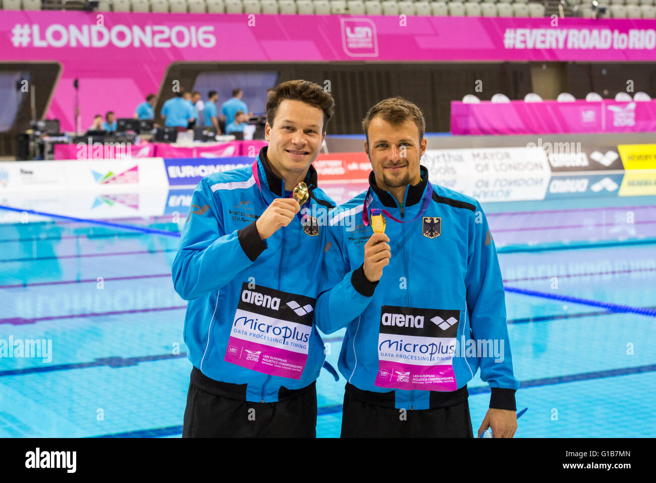 Aquatics Centre, Olympic Park, London, UK. 12th May 2016. The German 'Dream Team' and 2013 World Champions. German divers Sascha Klein and  Patrick Hausding pose with their gold medals, the British team of Tom Daley and Daniel Goodfellow win silver in the Diving Men’s 10m Synchro Final Credit:  Imageplotter News and Sports/Alamy Live News Stock Photo