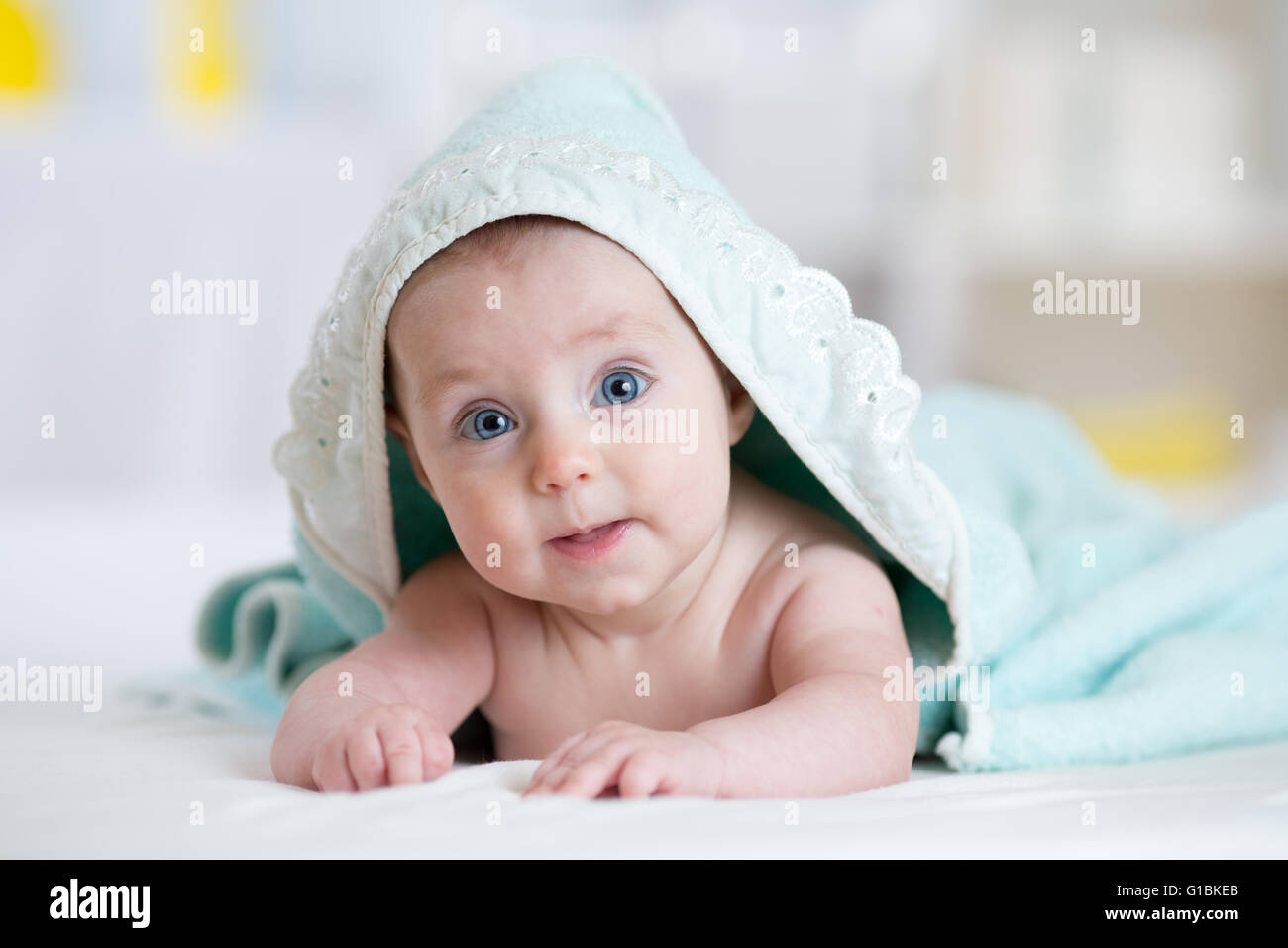 Adorable Happy Baby Under Towel Indoor Stock Photo Alamy