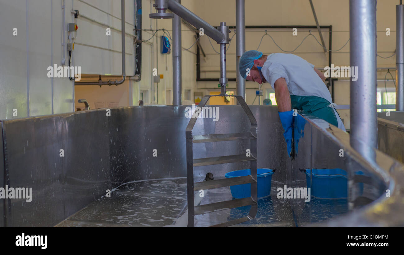 Man cleaning industrial vat Stock Photo Alamy