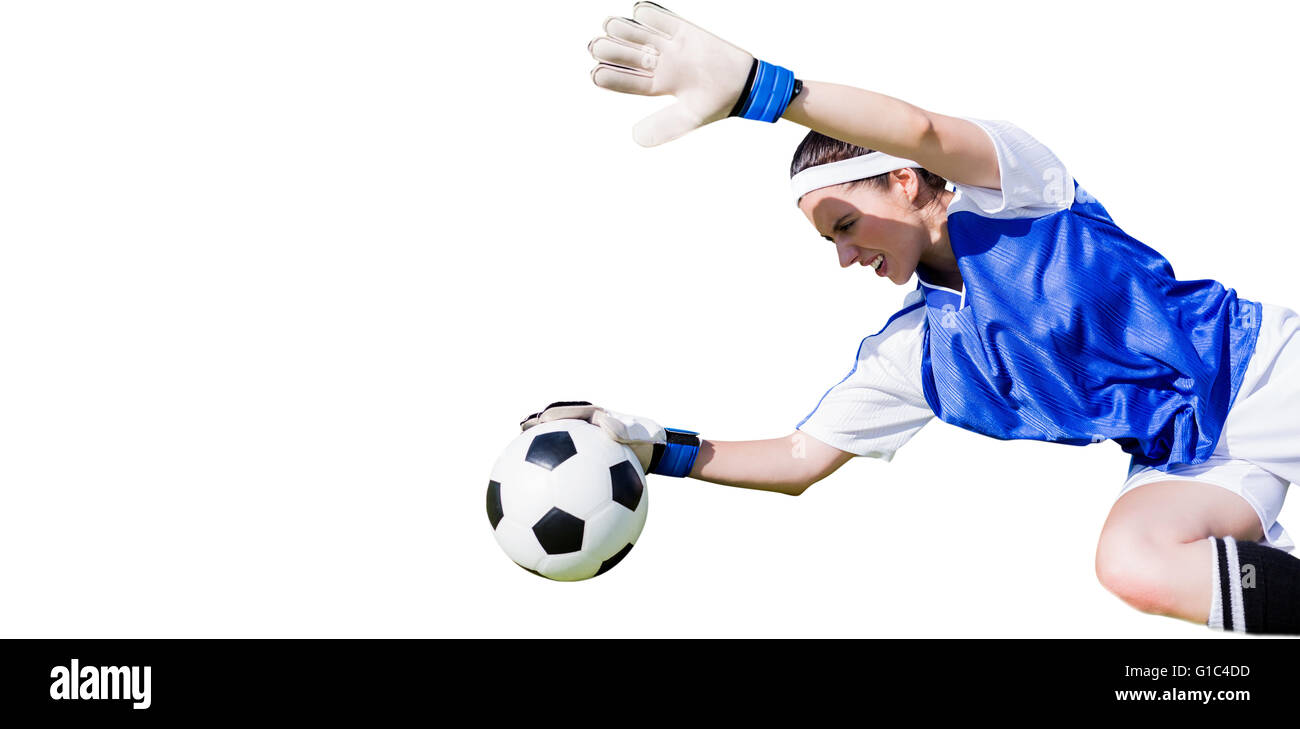 Woman goalkeeper stopping a goal Stock Photo