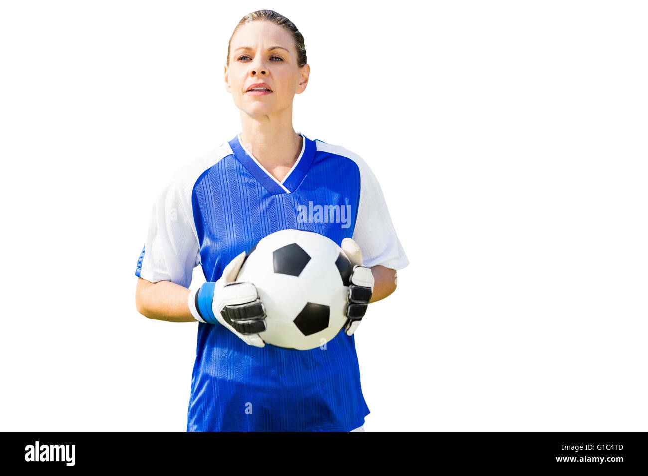 Woman goalkeeper posing with a ball Stock Photo