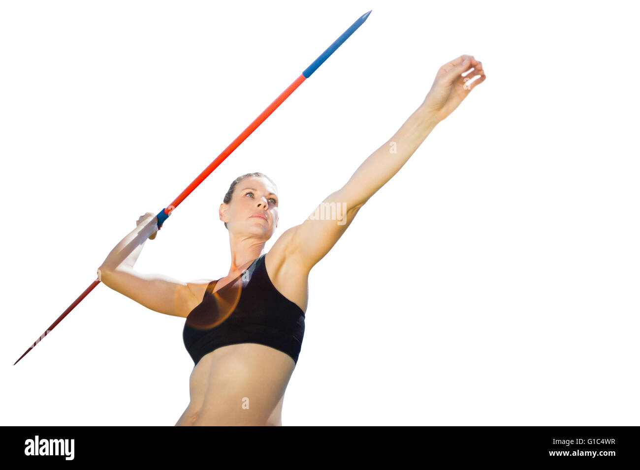 Low angle view of sportswoman is practising javelin throw Stock Photo