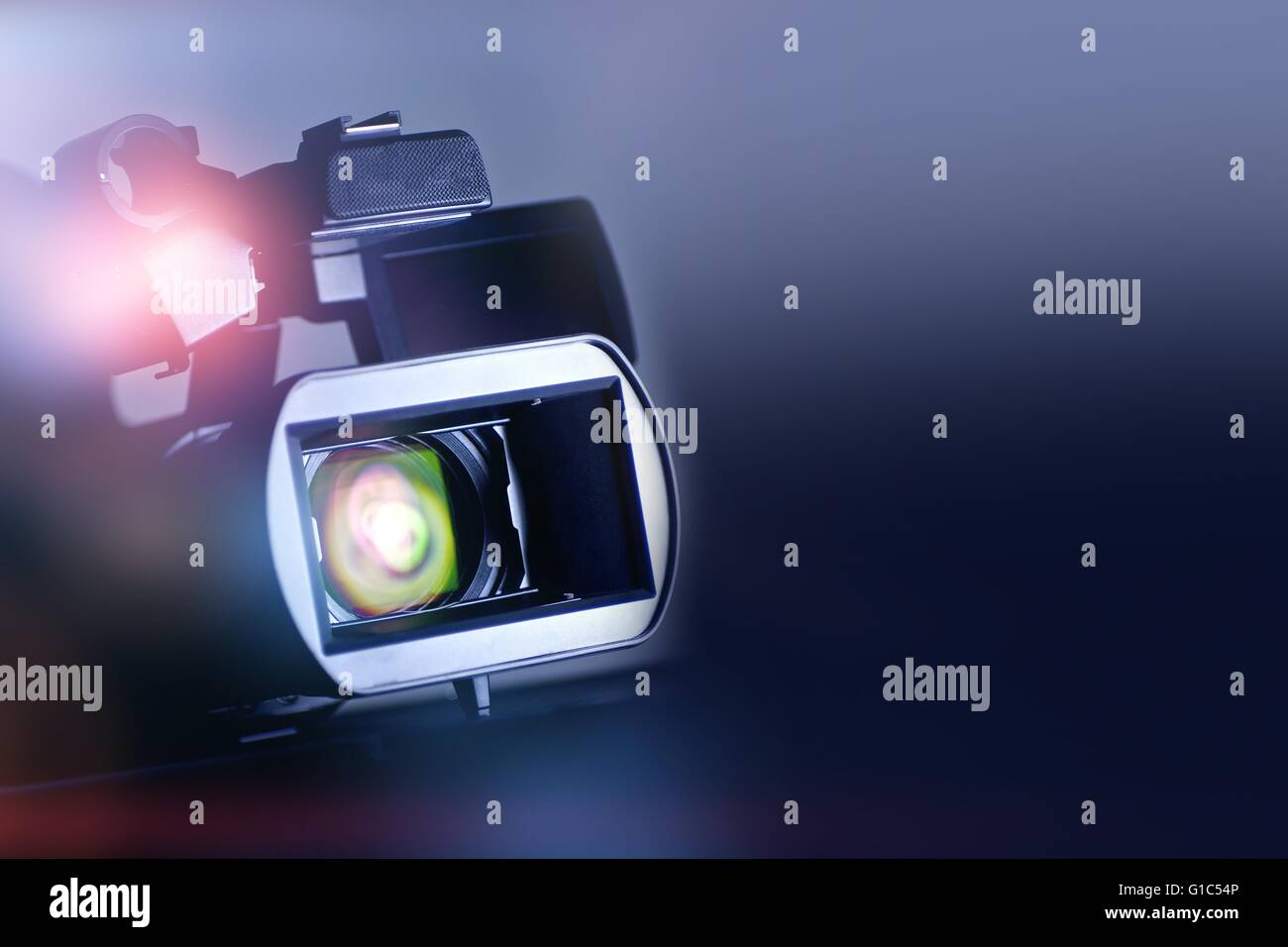 Video Motion Picture Background with Modern Digital Motion Picture Video Camera Stock Photo