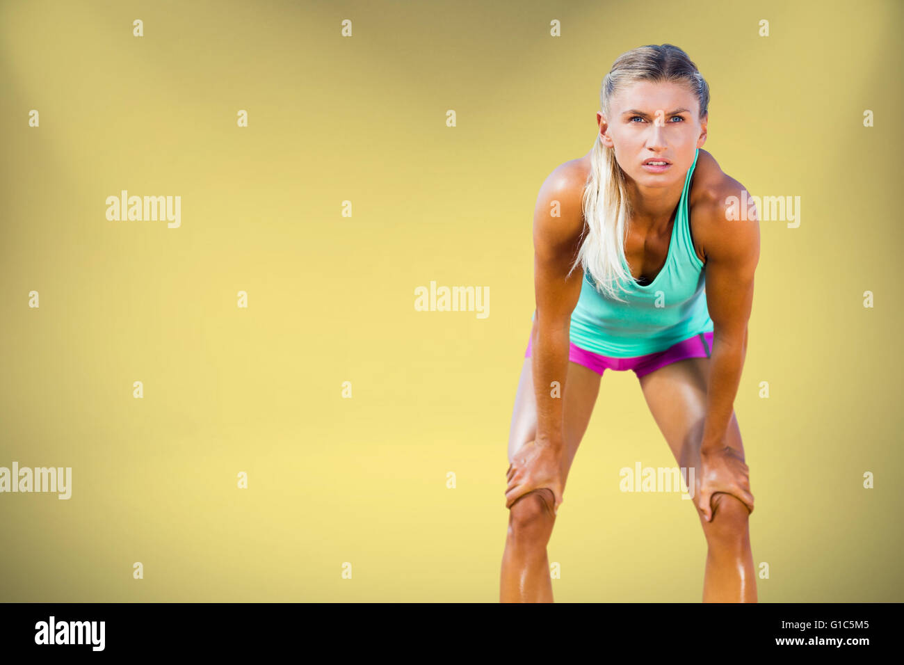Composite image of exhausted woman after her run Stock Photo