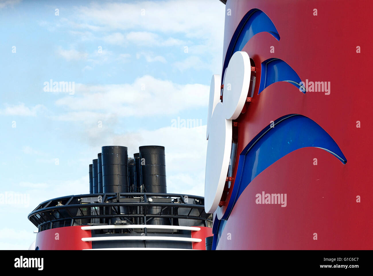 Close-up image of the smokestack of the Disney Dream cruise ship and logo during a cruise between the U.S. and The Bahamas. Stock Photo