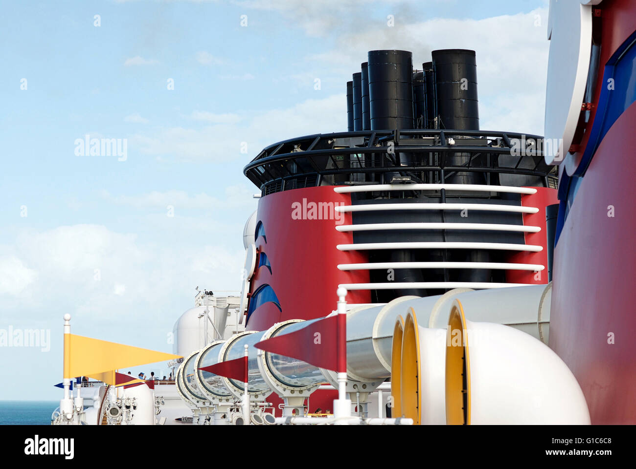 Close-up image of the smokestack of the Disney Dream cruise ship and AquaDuck during a cruise between the U.S. and The Bahamas. Stock Photo