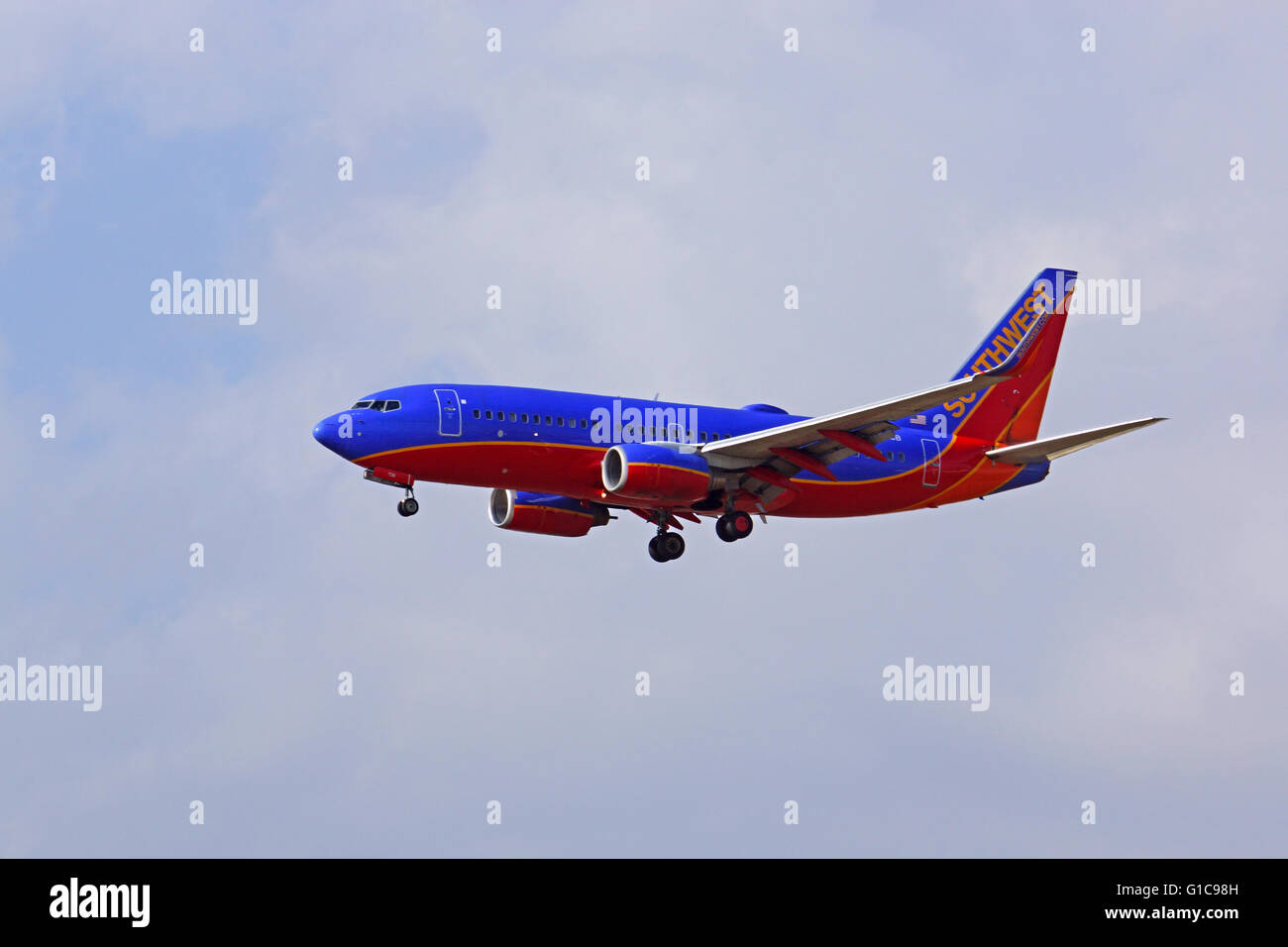 Commercial Southwest Airlines jet airplane landing at Ontario International Airport, outside of Los Angeles, California Stock Photo