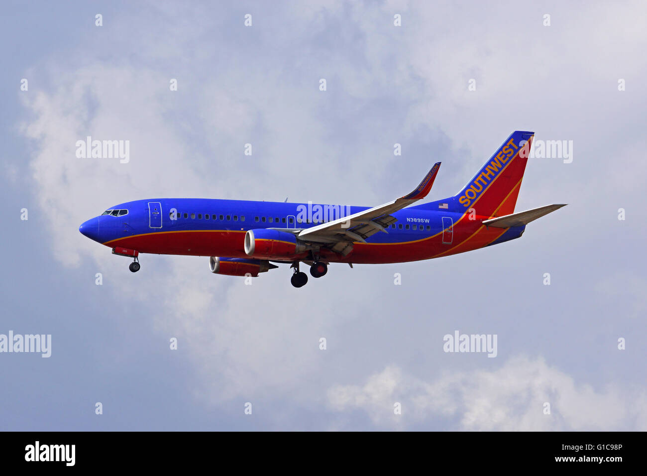Commercial Southwest Airlines jumbo jet airplane landing at Ontario International Airport, outside of Los Angeles, California Stock Photo