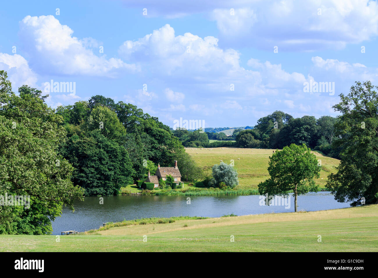 Lakeside cottage orné in Bowood House park and grounds designed by Capability Brown, Calne, Wiltshire Stock Photo