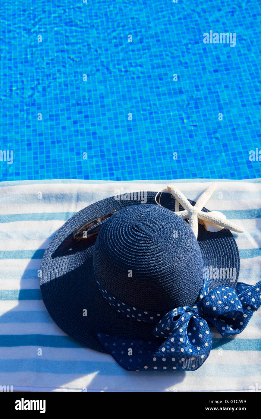 towel and bathing accessories near pool Stock Photo Alamy