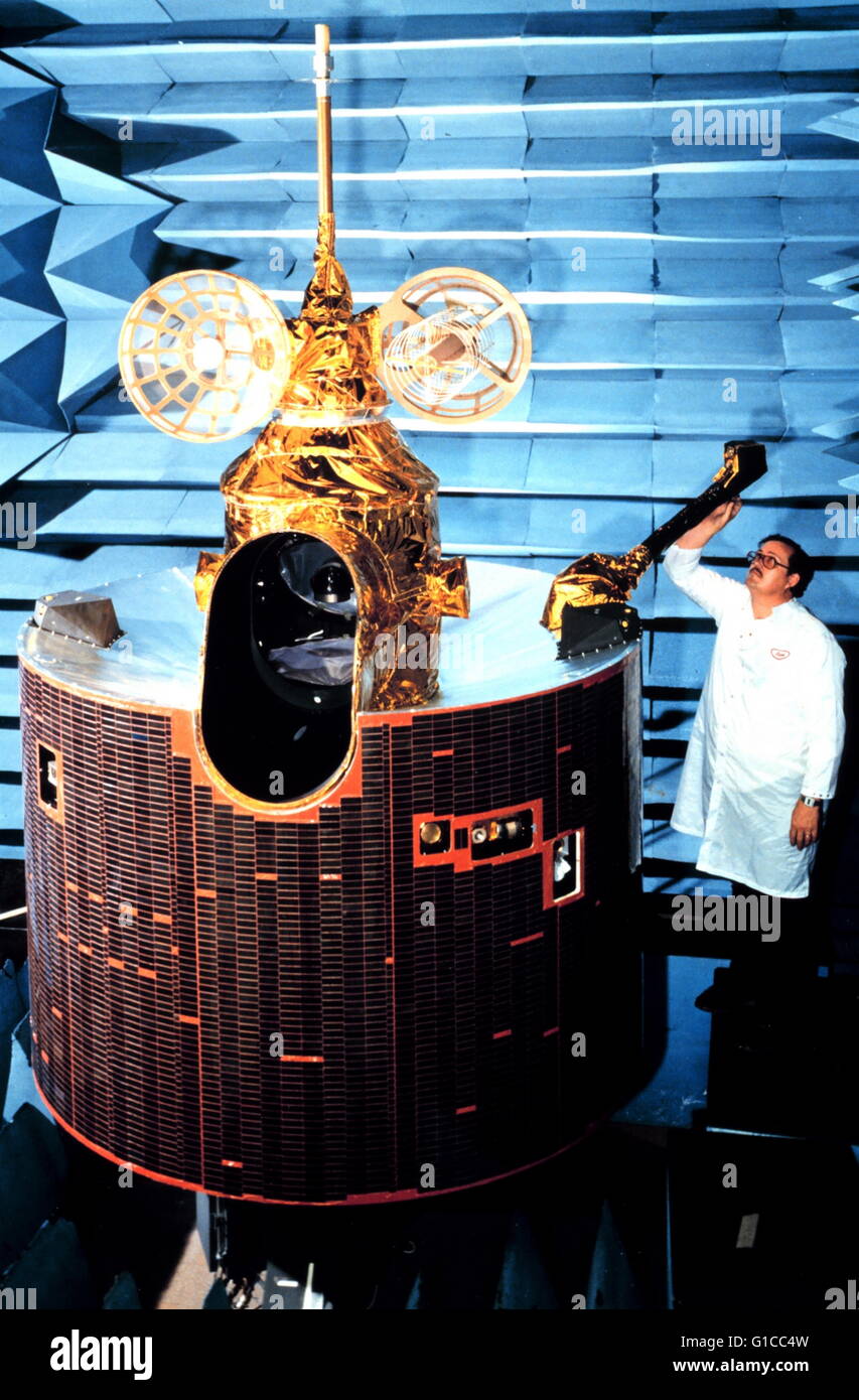Scientist working on GOES-D model satellite prior to launching 1980 Stock Photo