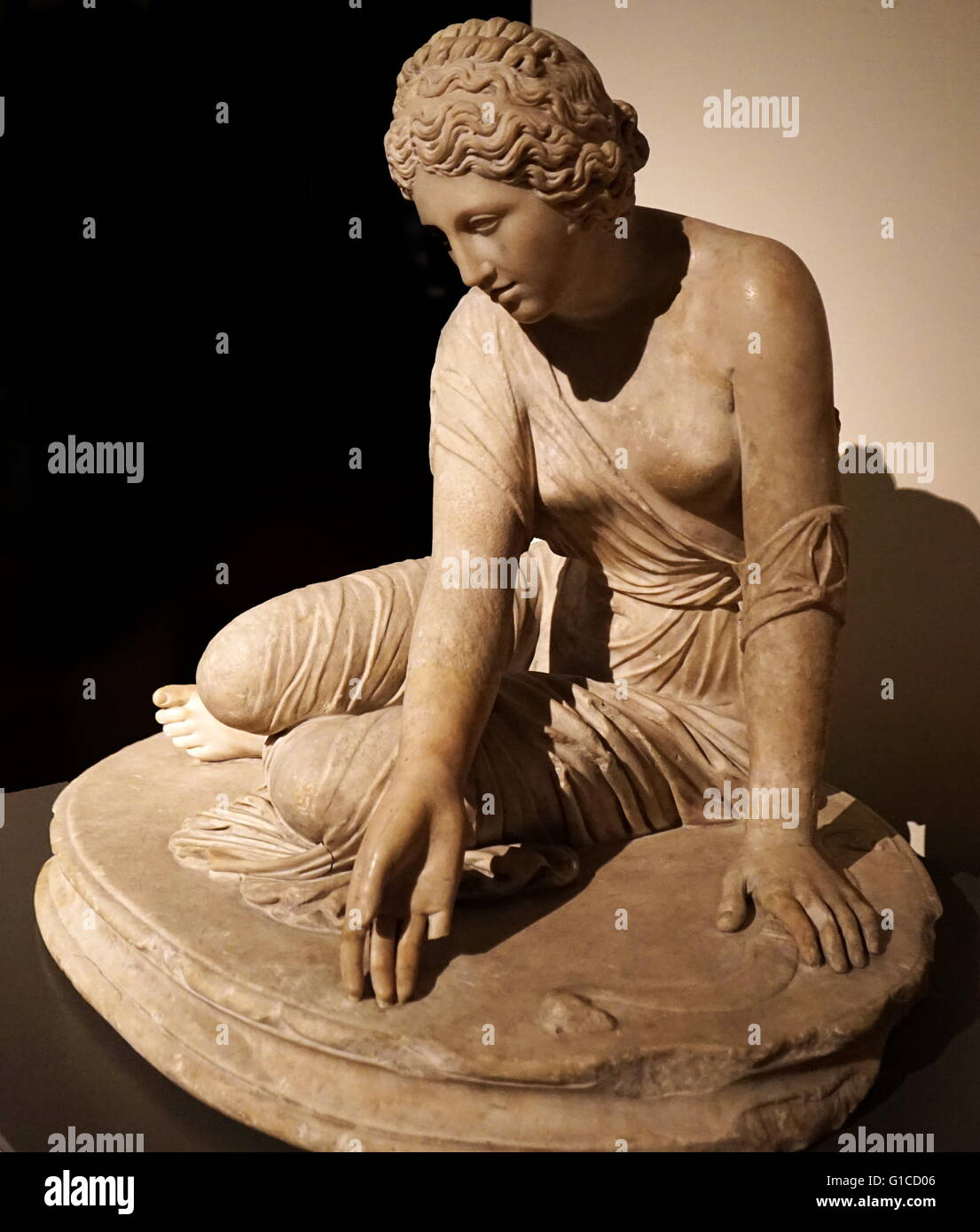 Marble statue of a young Roman girl playing Knucklebones, also known as Fivestones or Jacks, Dated 2nd Century AD Stock Photo