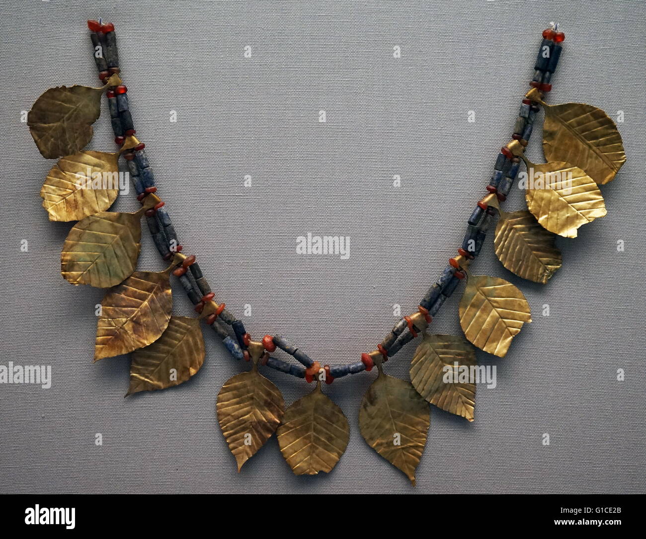 Woman's headdress of Carnelian and Lapis Lazuli beads with gold leaf pendants Stock Photo