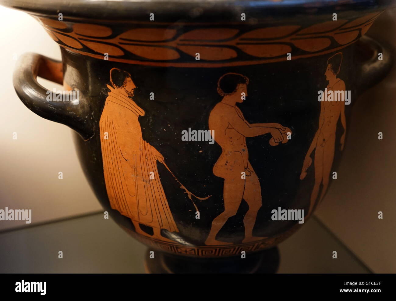 Red-figured bell-krater with Eos pursuing Kephalos, and a second youth. Dated 430 BC Stock Photo