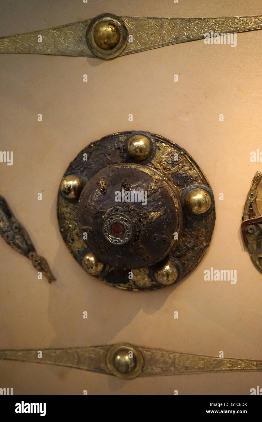 Anglo-Saxon shield with a metal rim and gilded copper alloy, gold and garnet fittings. Dated 7th Century Stock Photo