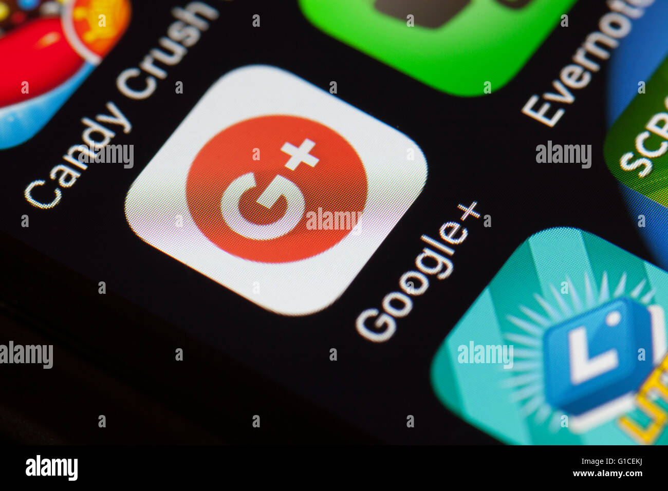 Google+ app icon on mobile phone. Stock Photo