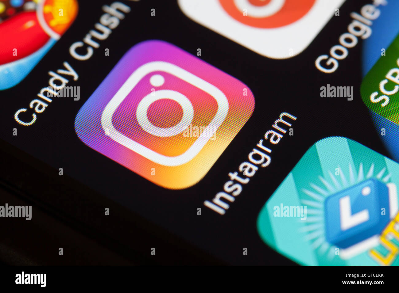 New Instagram app icon on mobile phone. Stock Photo