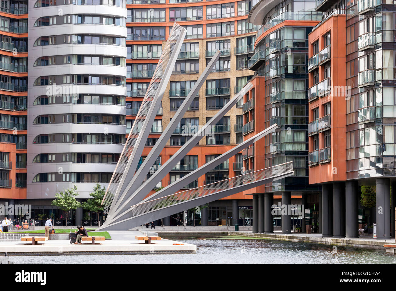 Bridge semi-raised with steel beams in fan-like position. Merchant Square Footbridge, London, United Kingdom. Architect: Knight Stock Photo