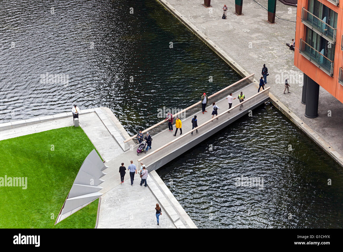 Basin viewed from above with bridge in lowered position. Merchant Square Footbridge, London, United Kingdom. Architect: Knight Architects Limited, 2014. Stock Photo