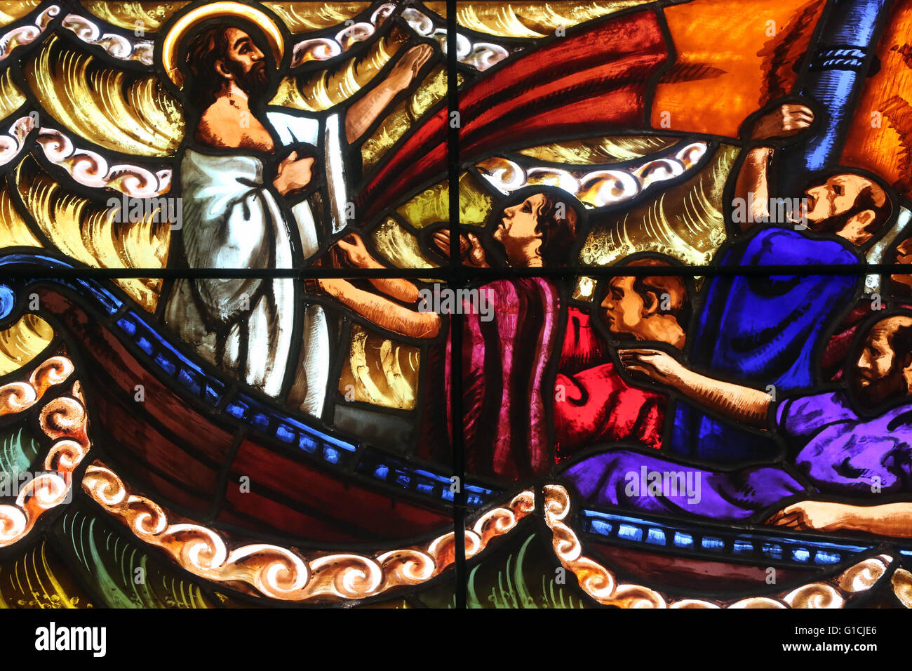 Carouge protestant temple.  Stained glass window. Jesus and the apostles. Matthew 8:25. And his disciples came to him, and awoke Stock Photo