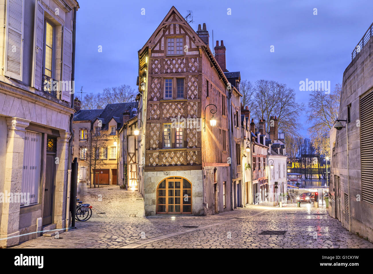 Street, paved with stone blocks and half-timbered house in the center of Orleans, France Stock Photo