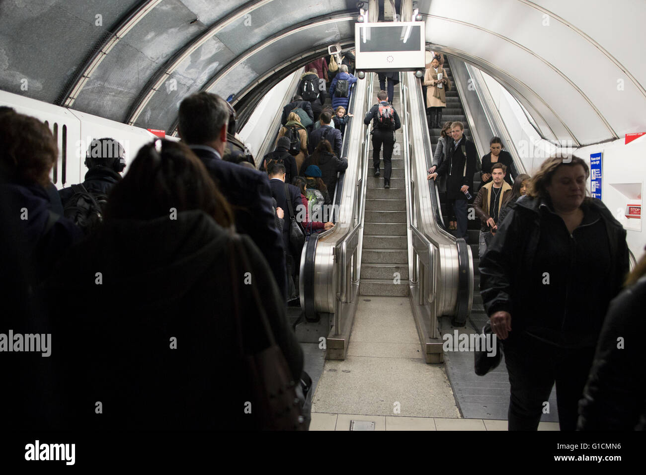 Commuters traveling up the escalator at Bank tube station, London, UK Stock Photo