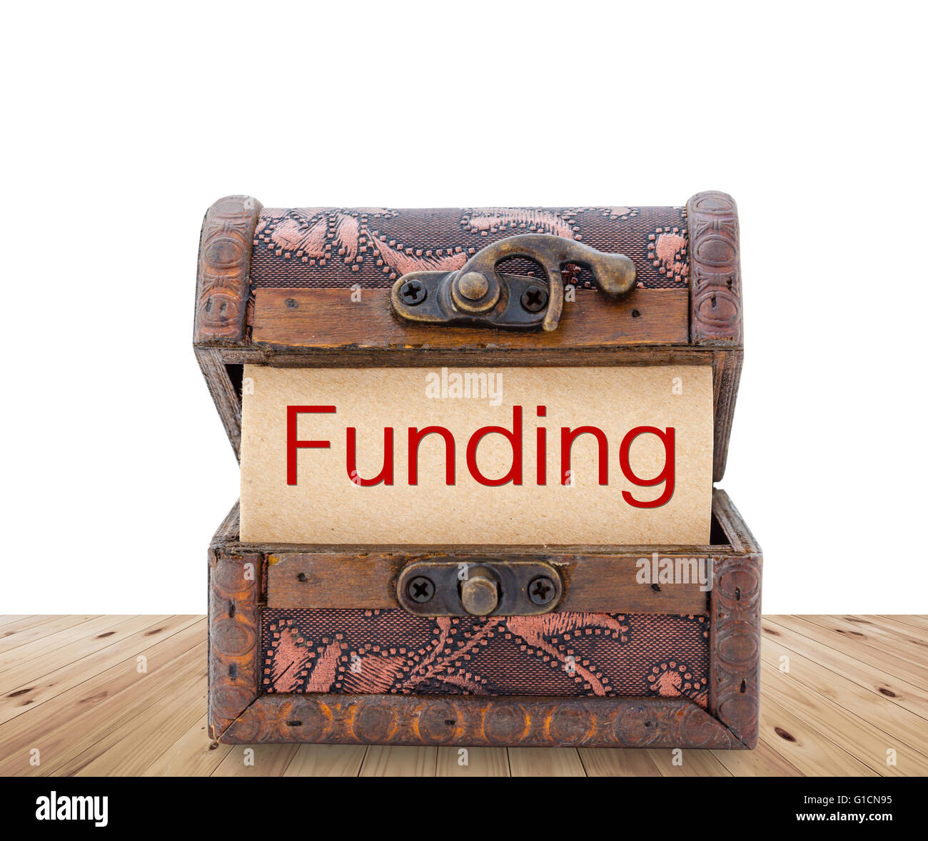 Funding word on paper in treasure chest. Business concept. Stock Photo