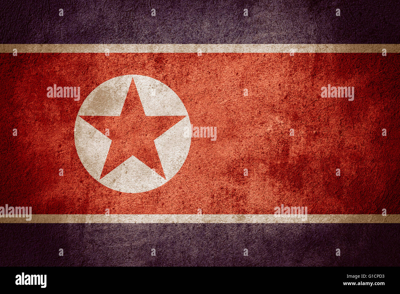 flag of North Korea or banner on rough pattern background Stock Photo