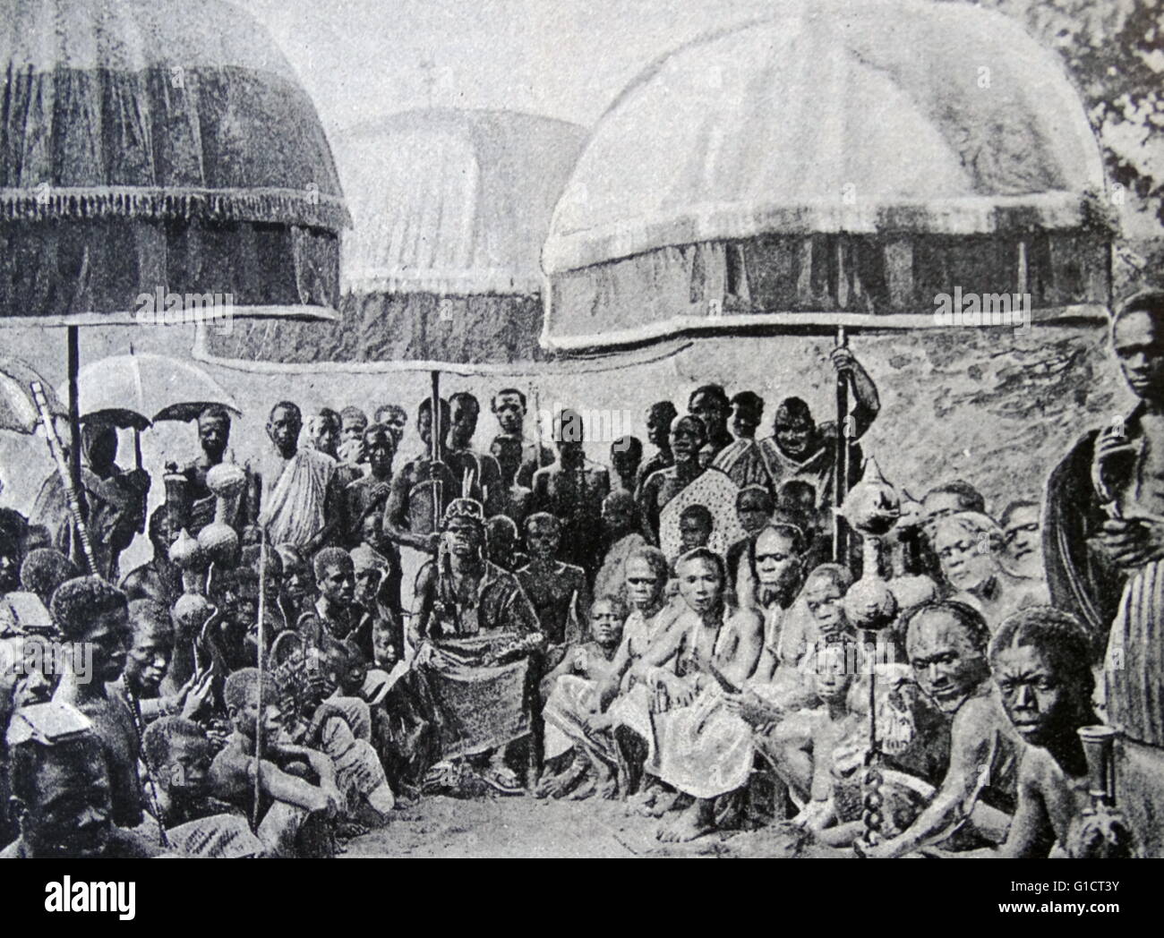 Engraving depicting an African Chief seated in State among his Headmen. Dated 19th Century Stock Photo