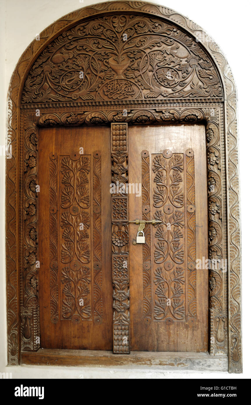 Carved wooden doors of stone town Stock Photo - Alamy