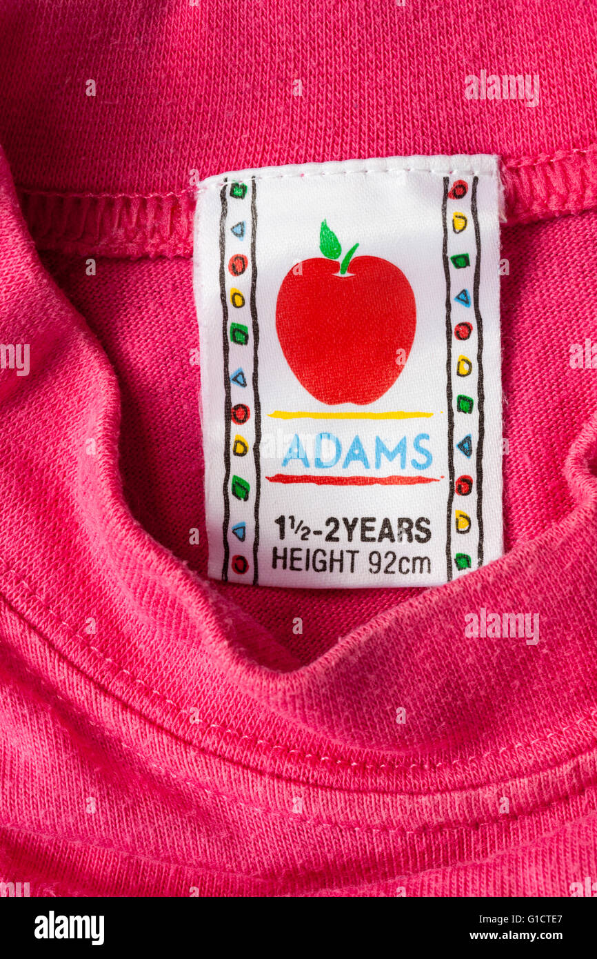 Adams label in child's pink clothing for ages 1 1/2-2 years Stock Photo