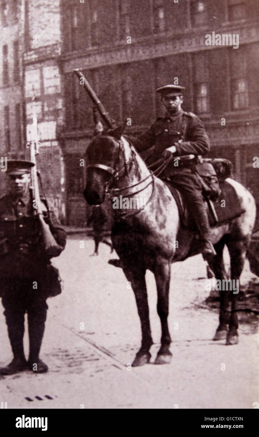 British mounted soldier on guard in Dublin; during the Easter Rising; an armed insurrection in Ireland during Easter Week; 1916. The Rising was mounted by Irish republicans to end British rule in Ireland and establish an independent Irish Republic Stock Photo