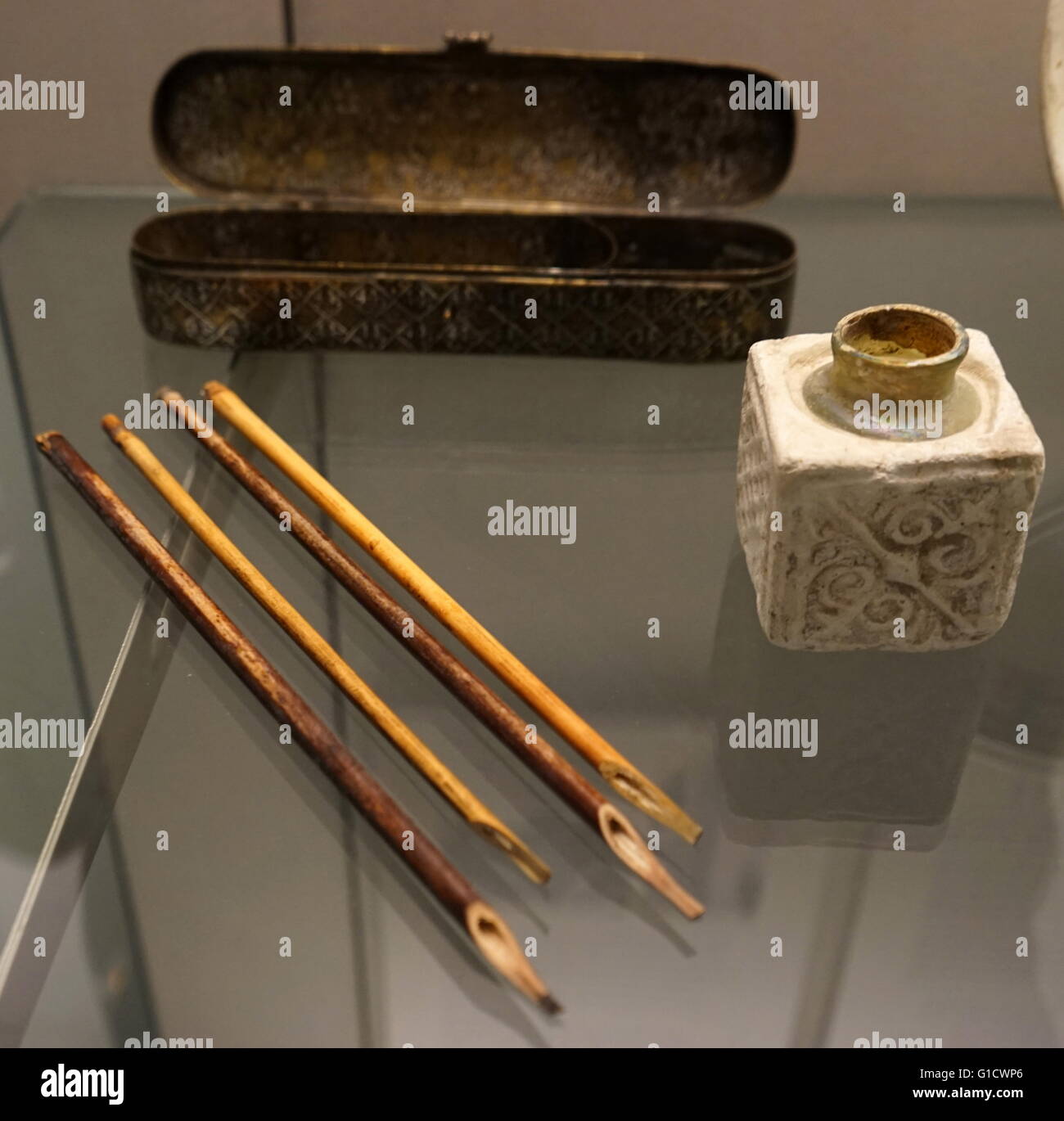 Reed pens and inkwell with opaque with moulded casing from the 10th