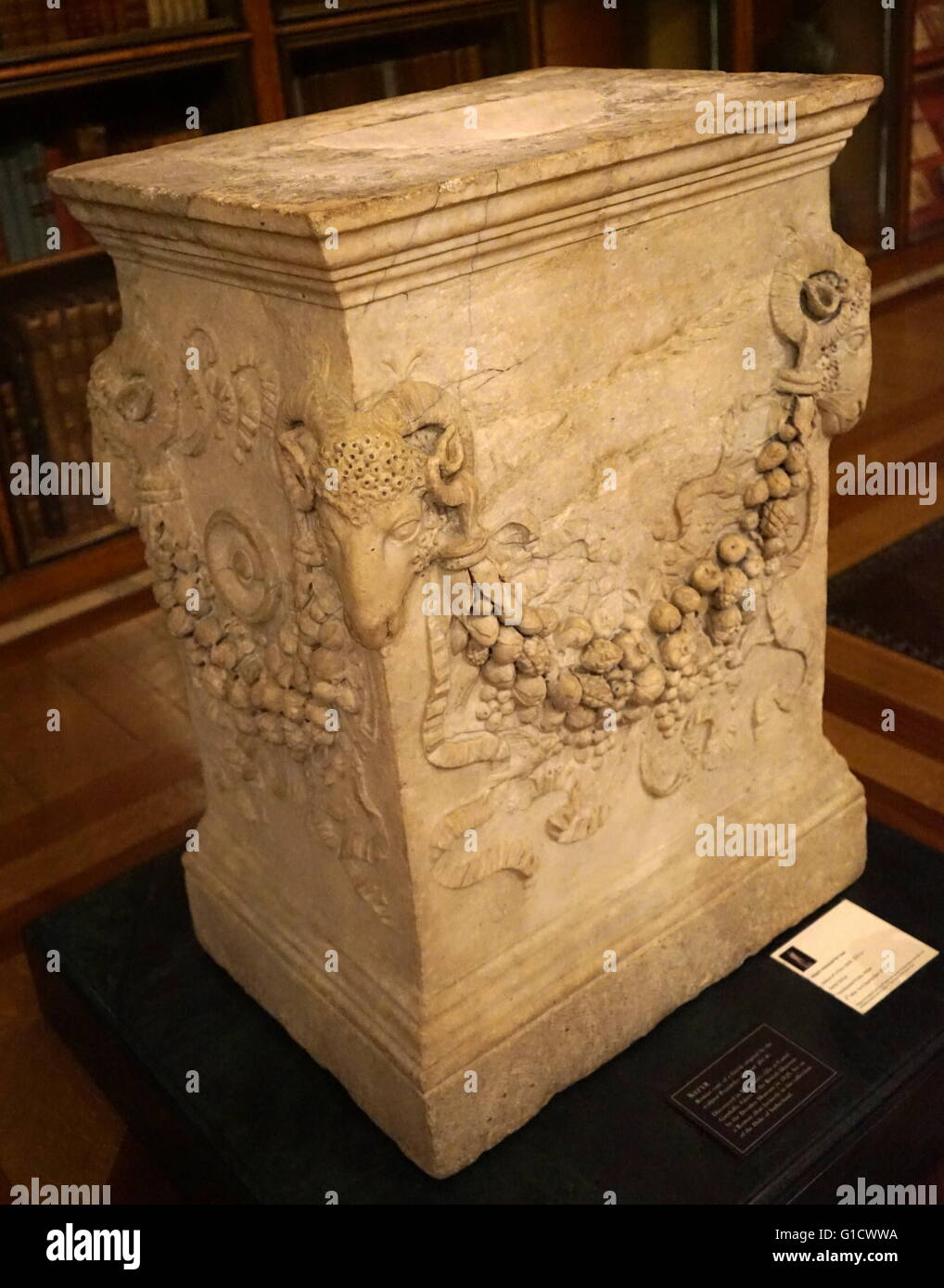 Roman copy of a Greek original pedestal, used as a base to support a statue. Dated 4th Century BC Stock Photo