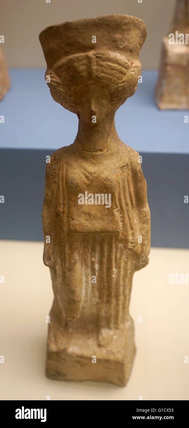Terracotta figure of a woman wearing a Peplos and Polos crown. Dated 5th  Century BC Stock Photo - Alamy