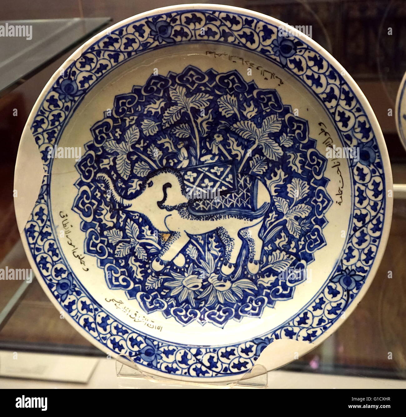Dish decorated with an elephant and figures in a howdah. Dated 17th Century Stock Photo