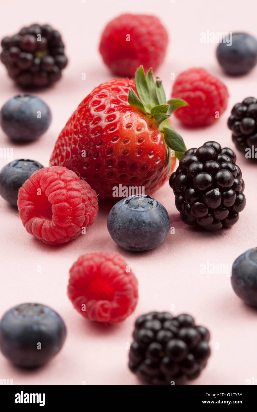 Mixed berries consisting of strawberries, blackberries, raspberries, blueberries Stock Photo