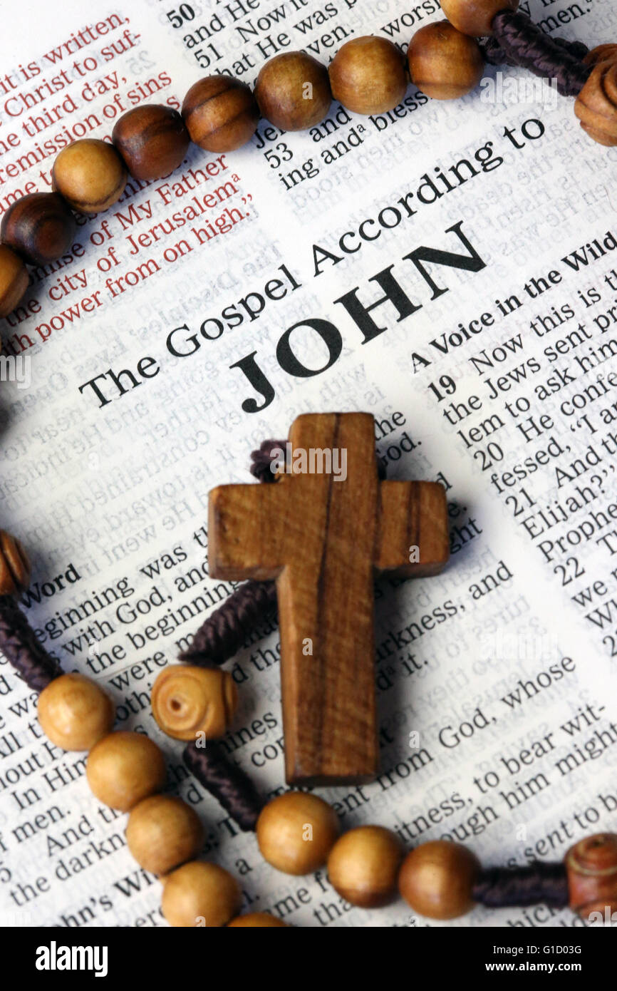 Holy Bible and rosary.  The Gospel According to John.  France. Stock Photo