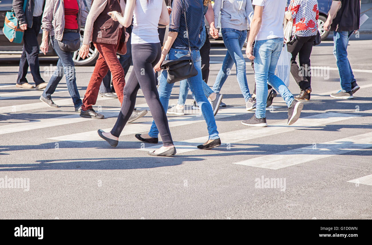 Spring Crosswalk pedestrians walking on a crosswalk on sunny spring day Stock Photo - Alamy